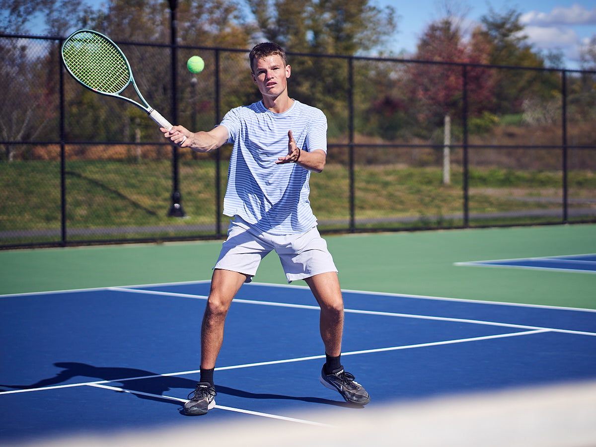 liam krall in match tee playing tennis